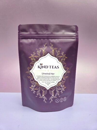 Purple resealable tea bag pouch with gold botanical design and a white label reading 'Kind Teas Unwind Her' (50g)